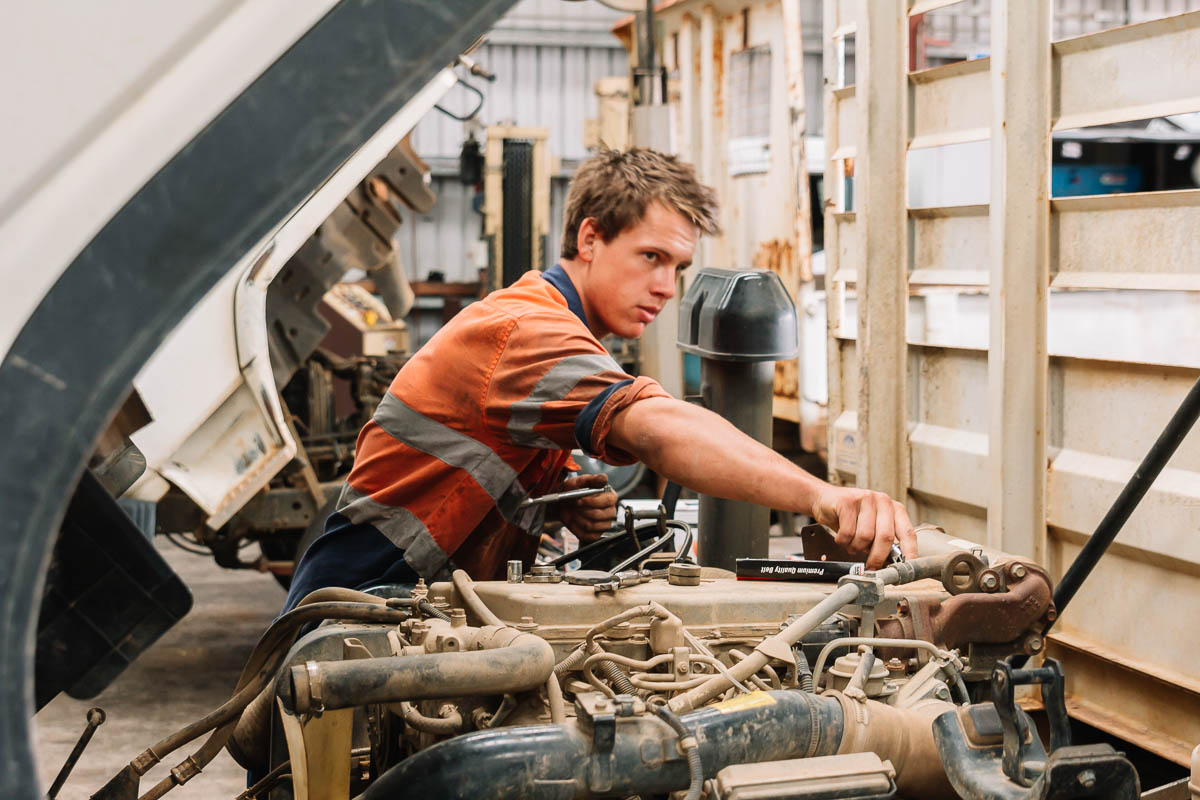 One of our staff diagnosing an issue with a truck